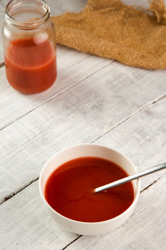 sweet and sour sauce in jar and bowl