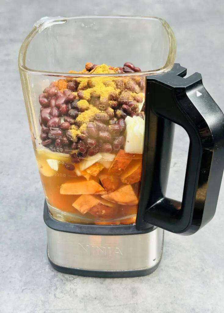 ingredients for black bean and sweet potato soup in a Ninja soup maker jug