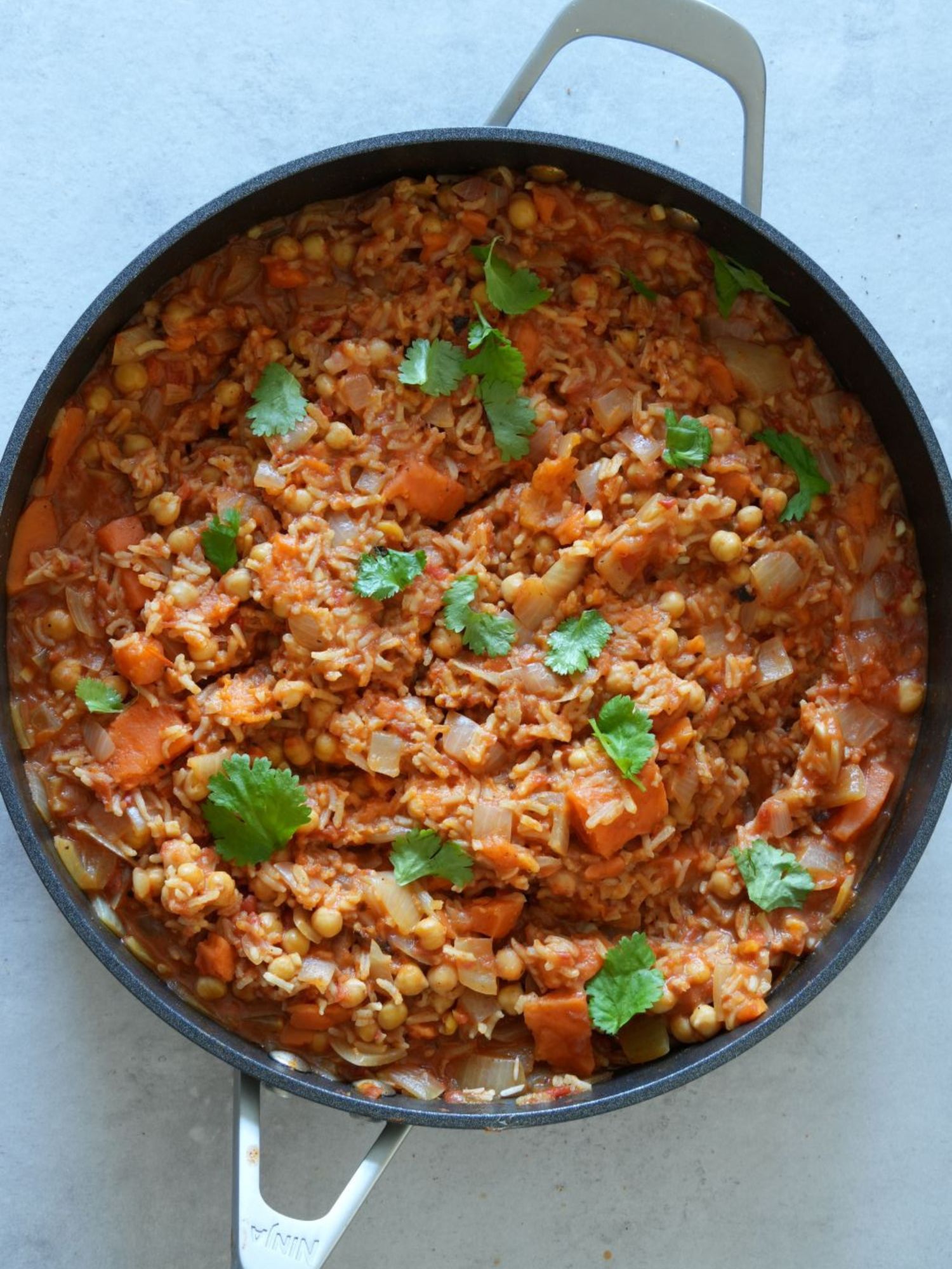 sweet potato and chickpea curry with fresh coriander in a ninja sauce pan