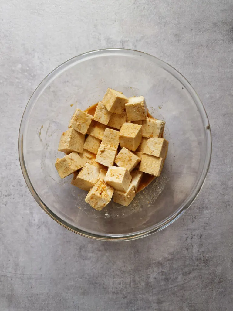 marinate tofu chunks in seasoning, soy sauce, sesame oil and cornflour