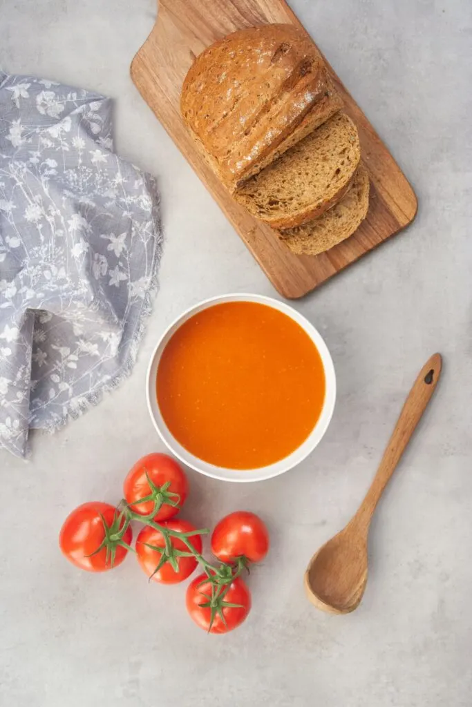 tomato soup with fresh tomatoes and bread