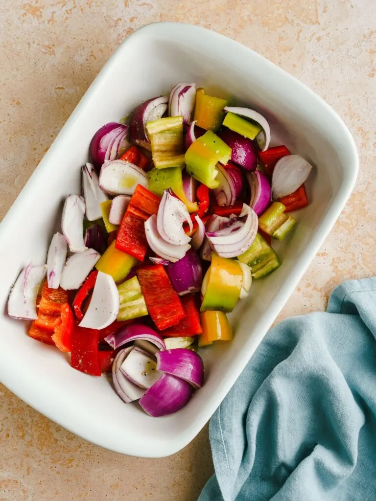 vegetables in tray for harissa chicken tray bake