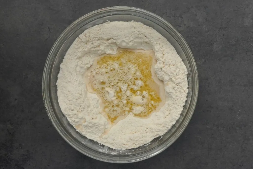 water and yeast added to flour